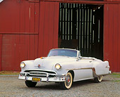 AUT 21 RK0402 05
1954 White Pontiac Starchief Convertible 3/4 Front View By Red Barn Headlights On