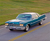 AUT 21 RK1001 04
1957 Chrysler Imperial Crown Coupe Teal 3/4 Front View On Road Hill By Grass Headlights On