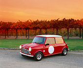 AUT 21 RK1600 06
1959 Mini Cooper Red And White 3/4 Front View On Gravel By Vineyard Filtered