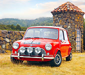 AUT 22 BK0016 01
1960 Mini Mark I Red 3/4 Front View On Dry Grass By Stone Wall