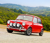 AUT 22 BK0020 01
1960 Mini Mark I Red 3/4 Front View On Gravel By Hills