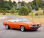 AUT 22 BK0050 01
1969 Pontiac Firebird Convertible Orange 3/4 Front View On Road By House On Hill
