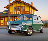 AUT 22 BK0083 01
1967 Austin Mini Cooper Mark II Green 3/4 Front View On Pavement By Building