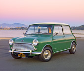 AUT 22 BK0084 01
1967 Austin Mini Cooper Mark II Green 3/4 Front View On Pavement By Water At Dusk