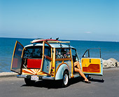 AUT 22 RK2229 07
1967 Morris Minor 1000 Light Blue 3/4 Rear View Doors Open By Water With Woman