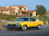 AUT 22 RK3034 01
1968 Chevrolet Chevelle SS 396 Yellow 3/4 Front View On Pavement By House