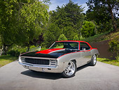 AUT 22 RK3063 01
1969 Chevrolet Camaro Pro Street Red, Black And Silver 3/4 Front View On Pavement By Trees