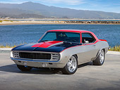 AUT 22 RK3071 01
1969 Chevrolet Camaro Pro Street Red, Black And Silver 3/4 Rear View On Pavement By Beach