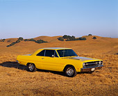 AUT 22 RK0468 01
1969 Dodge Dart Swinger 340 Yellow 3/4 Side View On Dry Grass