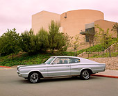 AUT 22 RK1527 04
1967 Dodge Charger 383 Silver 3/4 Side View On Pavement By Building And Trees