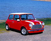 AUT 22 RK2040 01
1969 Austin Mini Cooper Mk III Red With White Stripes 3/4 Front View On Pavement By Water