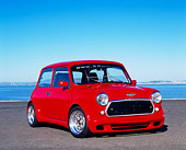 AUT 22 RK2045 05
1969 Austin Mini Cooper Custom Red 3/4 Front View On Pavement By Water