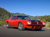AUT 23 RK1978 01
1974 Pontiac Firebird Formula 400 Red 3/4 Front View On Pavement By Trees
