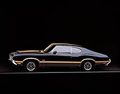 AUT 23 RK0096 06
1970 Oldsmobile 442 W-30 Black Gold Stripe 3/4 Front View On Gray Line Studio