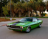 AUT 23 RK0369 04
1970 Dodge Challenger SE Green 3/4 Front View On Pavement Trees Background