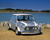 AUT 23 RK0484 01
1973 Austin Mini Cooper Modified Silver White Stripe Front 3/4 View On Dirt