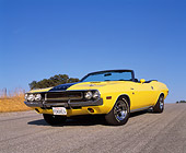 AUT 23 RK0622 03
1970 Dodge Challenger 440 Convertible Yellow With Black Stripes Low 3/4 Front View On Pavement