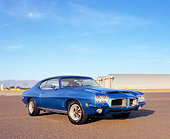 AUT 23 RK0840 01
1972 Pontiac GTO 455 Blue 3/4 Front View On Pavement By Hanger