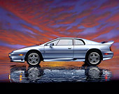 AUT 25 RK0354 02
1995 Lotus Esprit S4S Silver Side View On Mylar Floor Sunset Clouds Studio