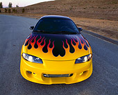 AUT 25 RK1168 01
1999 Mitsubishi Eclipse GSX Custom Black With Flames Wide Angle Head On Shot On Pavement