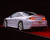 AUT 25 RK1284 01
1998 Mitsubishi Custom Modified Eclipse GS Silver And Black 3/4 Rear View Studio