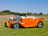 AUT 26 RK2831 01
1931 Ford Model A Roadster Pickup Truck Hot Rod Orange And Cream 3/4 Front View On Grass