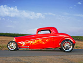 AUT 26 RK2851 01
1933 Ford Hi-Boy Coupe Hot Rod Red Profile View On Pavement
