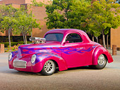 AUT 26 RK2863 01
1941 Willys Coupe Hot Rod Raspberry 3/4 Front View On Pavement By Building