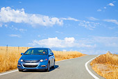 AUT 29 BK0010 01
2010 Honda Insight Blue 3/4 Front View Driving On Road