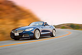 AUT 29 BK0022 01
2009 BMW Z4 Convertible Blue Driving On Road