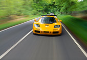 AUT 29 RK0001 03
1996 McLaren F1 LM Orange Head On On Road In Motion