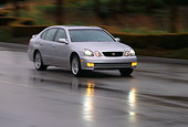 AUT 29 RK0049 01
1998 Lexus GS400 Silver 3/4 Front View On Wet Road In Motion