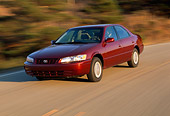 AUT 29 RK0223 08
1999 Toyota Camry CE Pearl Red 3/4 Front View On Road In Motion