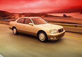 AUT 29 RK0267 03
1999 Lexus LS400 Champagne Side 3/4 View On Road In Motion