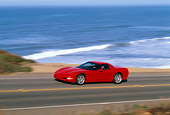 AUT 29 RK0272 03
1999 Chevrolet Corvette Red 3/4 Front View On Road In Motion