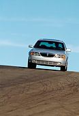 AUT 29 RK0297 06
2000 Lincoln LS Sport Sedan Silver Head On Shot On Road In Motion
