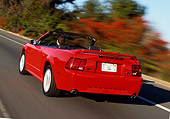 AUT 29 RK0496 08
2000 Ford Mustang GT Convertible Red 3/4 Rear View On Road In Motion