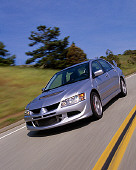 AUT 29 RK0638 38
2003 Mitsubishi Lancer Evolution VIII Silver Vishnu Tuning 3/4 Front View In Motion On Highway