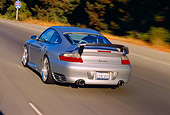 AUT 29 RK0658 06
2004 Porsche X50 Turbo Silver 3/4 Rear View On Road In Motion