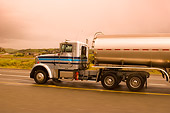 AUT 29 RK1162 01
Semi Truck On Road In Motion 3/4 Rear View