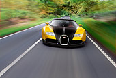 AUT 29 RK1186 01
2006 Bugatti Veyron Black And Yellow Coupe Head On In Motion On Road