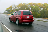 AUT 29 RK1194 01
2006 Chevrolet HHR Red 3/4 Rear View On Road In Motion