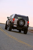 AUT 29 RK1370 01
2007 Hummer H3 Silver 3/4 Rear View On Road In Motion At Dusk