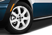 AUT 30 IZ1200 01
2010 Mini Cooper Convertible Blue Front Wheel Detail Studio