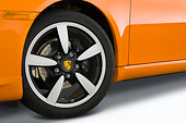 AUT 30 IZ0050 01
2008 Porsche Limited Edition Boxster Orange Front Wheel Detail Studio