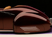 AUT 30 RK1898 01
1941 Packard Kustom Roadster Burgundy Detail Profile Rear Shot