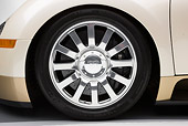 AUT 30 RK4423 01
2008 Bugatti Veyron 16.4 Grand Sport Roadster Gold And White Front Wheel Detail Studio