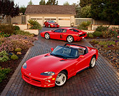 AUT 31 RK0010 15
1992 Red Ferrari And Viper 1994 Red Mercedes At 3/4 Angles On Driveway