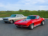AUT 31 RK0102 01
1967 Chevrolet Nova Beige & 1967 Chevrolet Corvette Red With Silver Stripe 3/4 Front View On Pavement By Hills