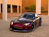 AUT 33 RK0354 01
2000 Honda S2000 Raspberry And Black 3/4 Front View On Pavement